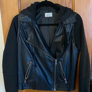 Faux leather with sweatshirt-style sleeves